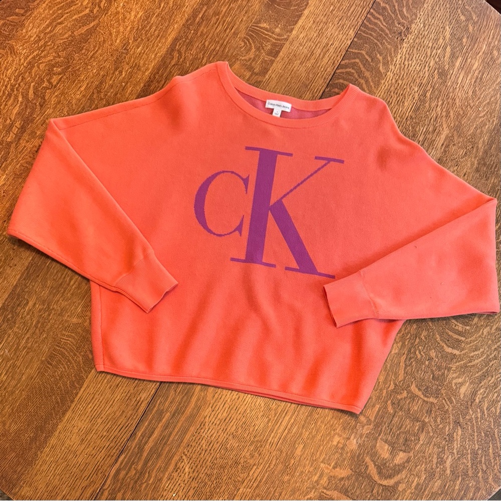 Calvin Klein Orange Sweater with Purple Logo